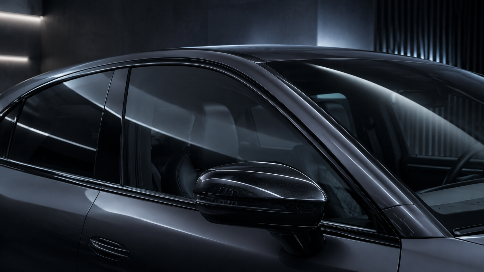 Premium automotive glass with controlled light transmission